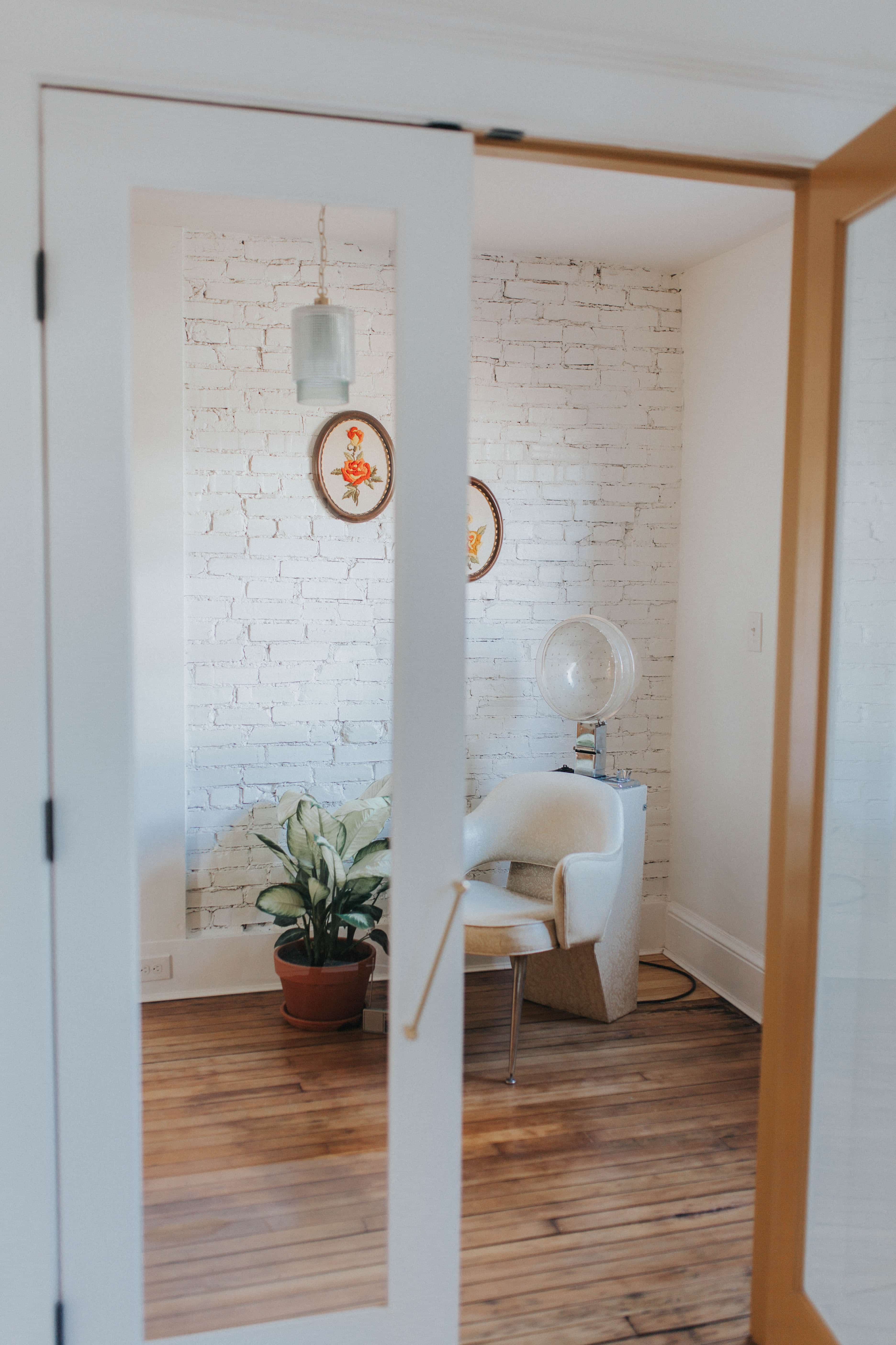 White office with exposed brick walls