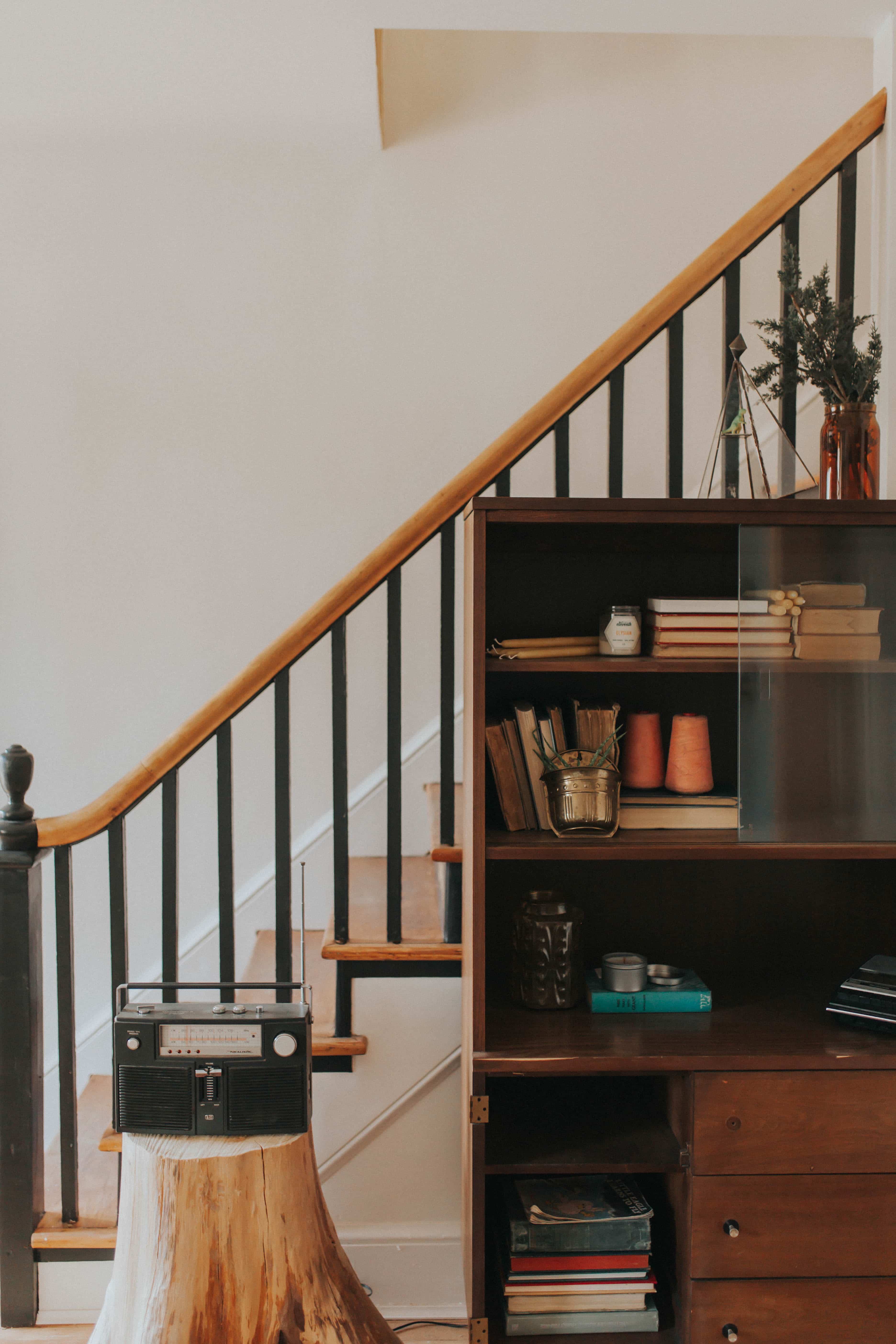 bookcase and stairs in renovated home